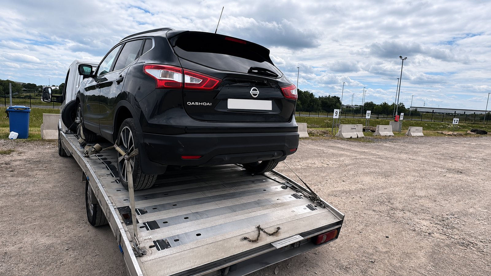 Nissan Qashqai on recovery trailer